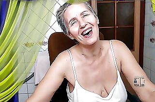 Cheerful housewife Lukerya hotly flirts with fans on webcam, controlling natural hanging boobs without the help of hands